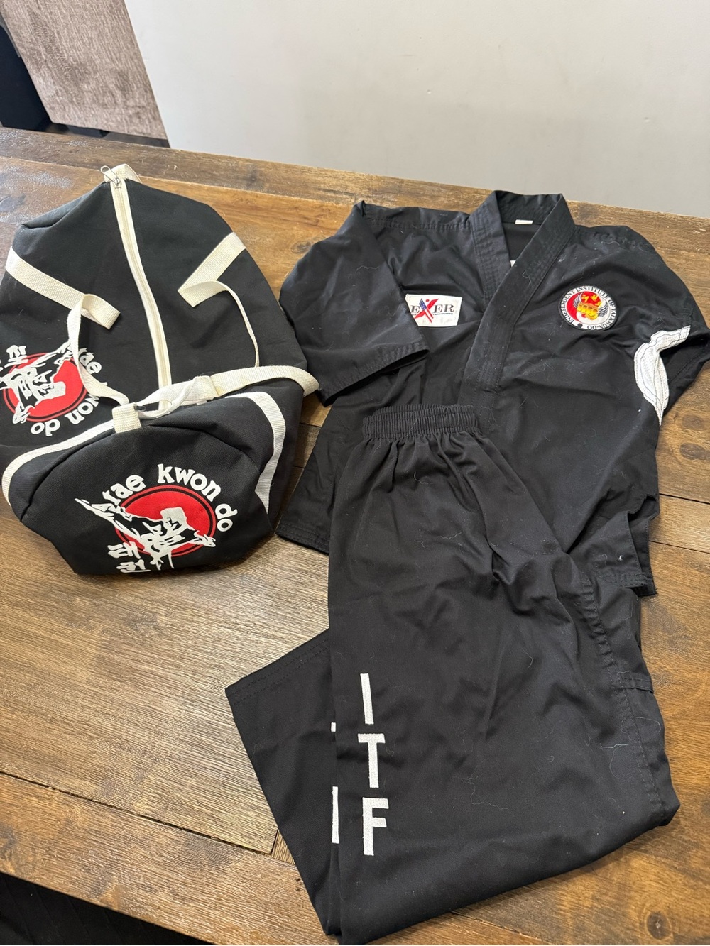 Black Taekwondo Uniform Set with Matching Gear